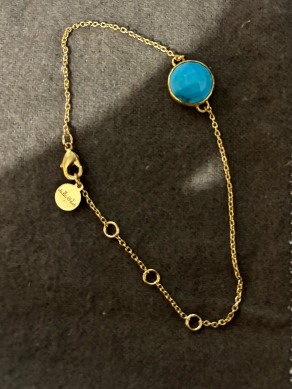 Stella and Dot delicate bracelet with blue center accent